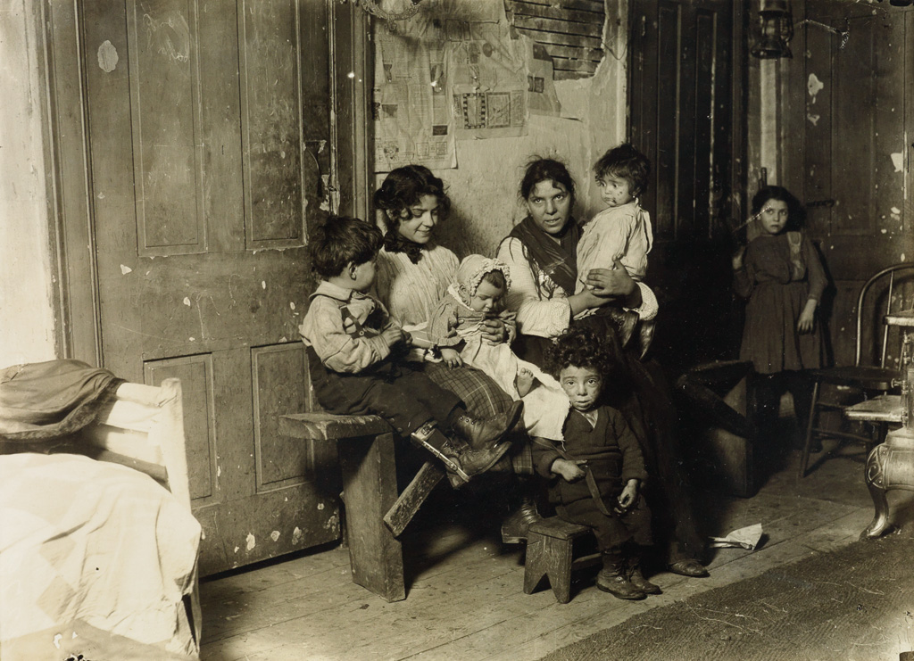 LEWIS W. HINE (1874-1940) Tenement family, Chicago.